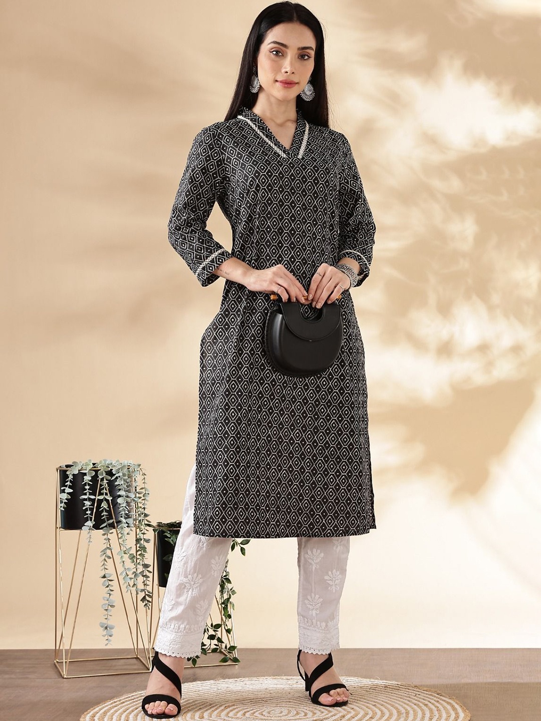 

Anouk Black Geometric Printed Thread Work V-Neck Straight Kurta