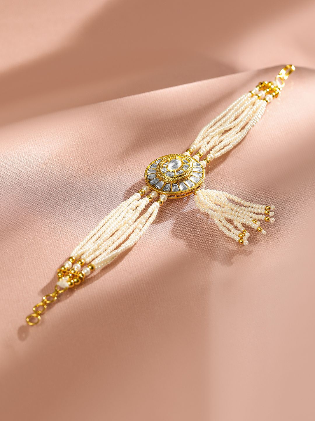 

Rubans 22K Gold Plated Kundan Studded & Pearl Beaded Traditional Bracelet