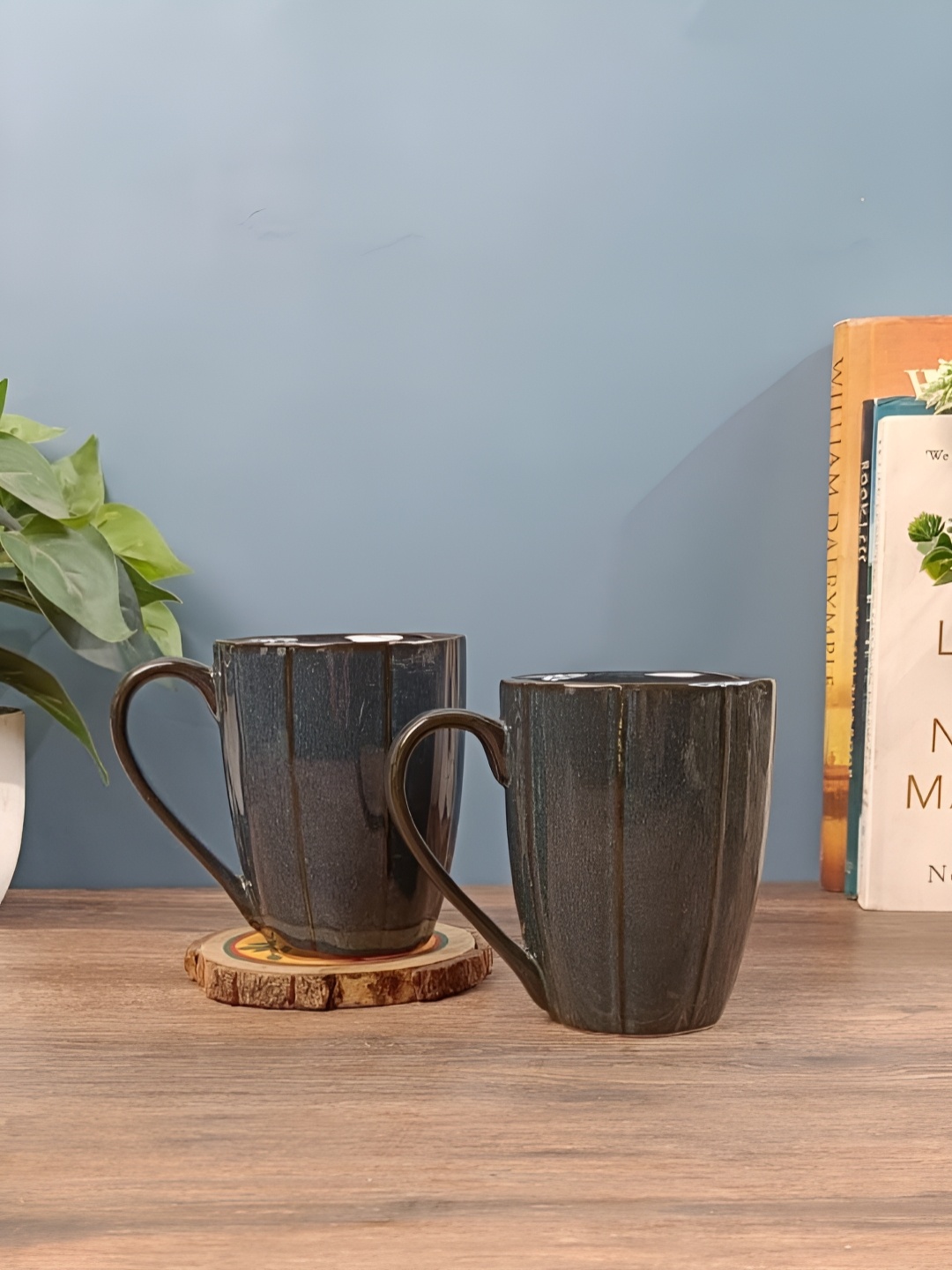 

Myntra Elegant Homes Black 2 Pieces Striped Glossy Microwave Safe Mugs - 225 ml Each
