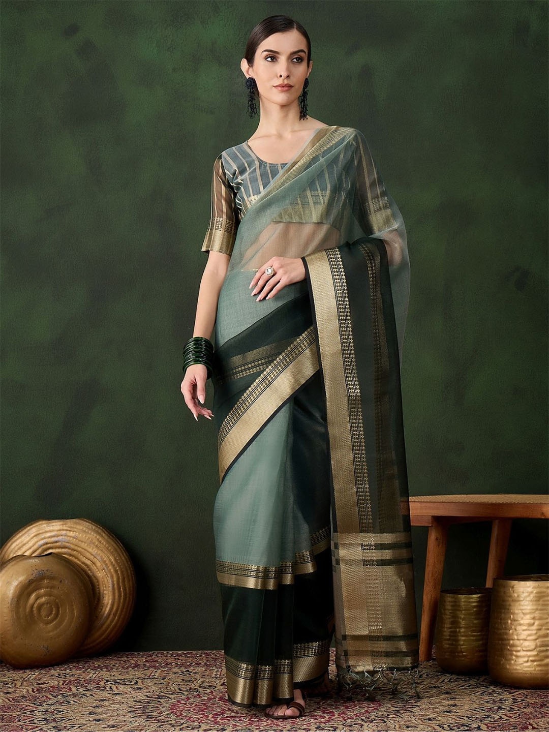 

ODETTE Dark Green Organza Woven Design Zari Saree With Unstitched Blouse