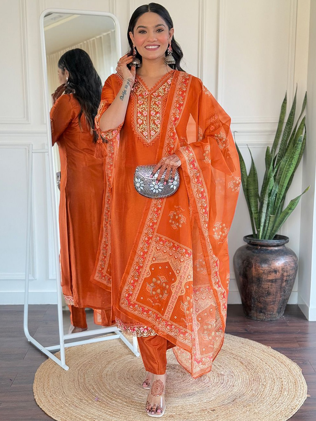 

PARNAVI Floral Embroidered Thread Work V-Neck Straight Kurta With Trousers & Dupatta, Orange