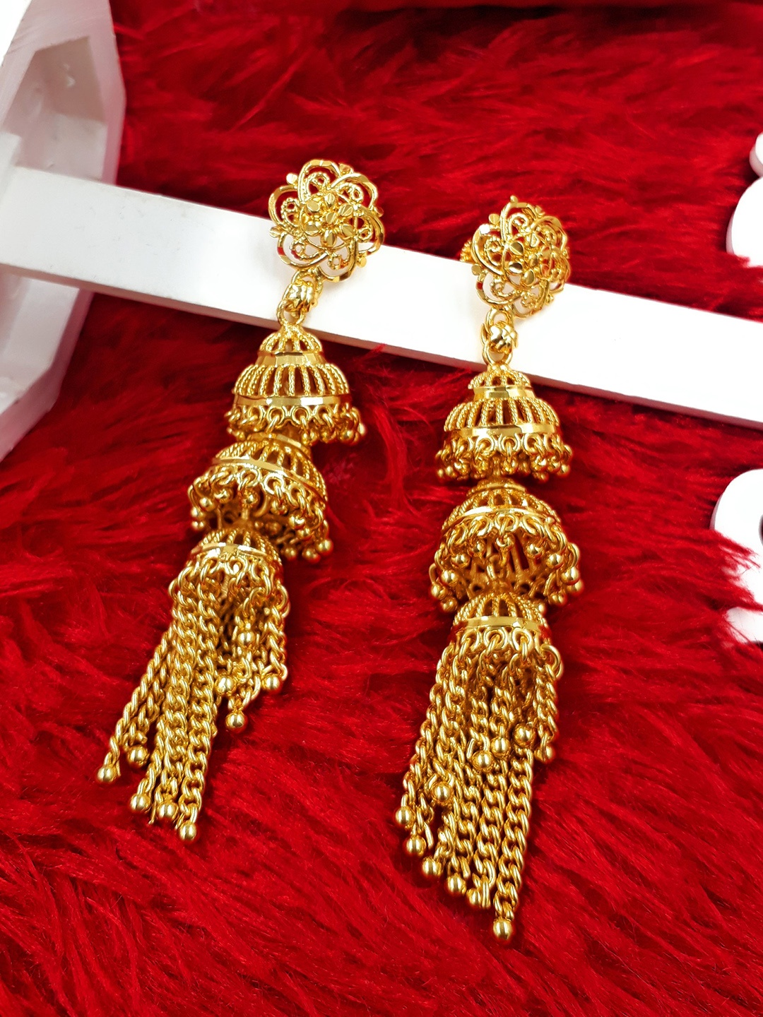 

Anujeet Fashion Hub Gold Plated Dome Shaped Tasselled Impon Jhumkas