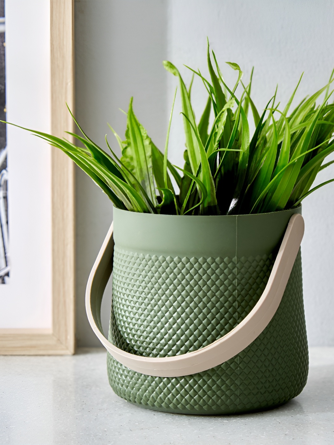 

Home Centre Green Garden Artificial Plant With Pot