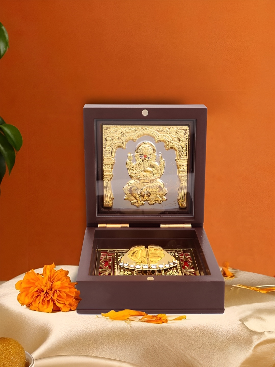 

INTERNATIONAL GIFT Gold-Toned Lord Ganesha Pocket Temple Religious Idol Showpiece