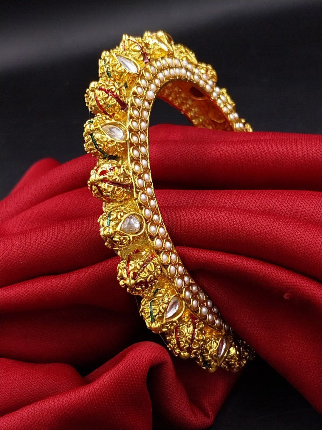 

Anouk Gold-Plated Kundan-Studded Jaipuri Bangle
