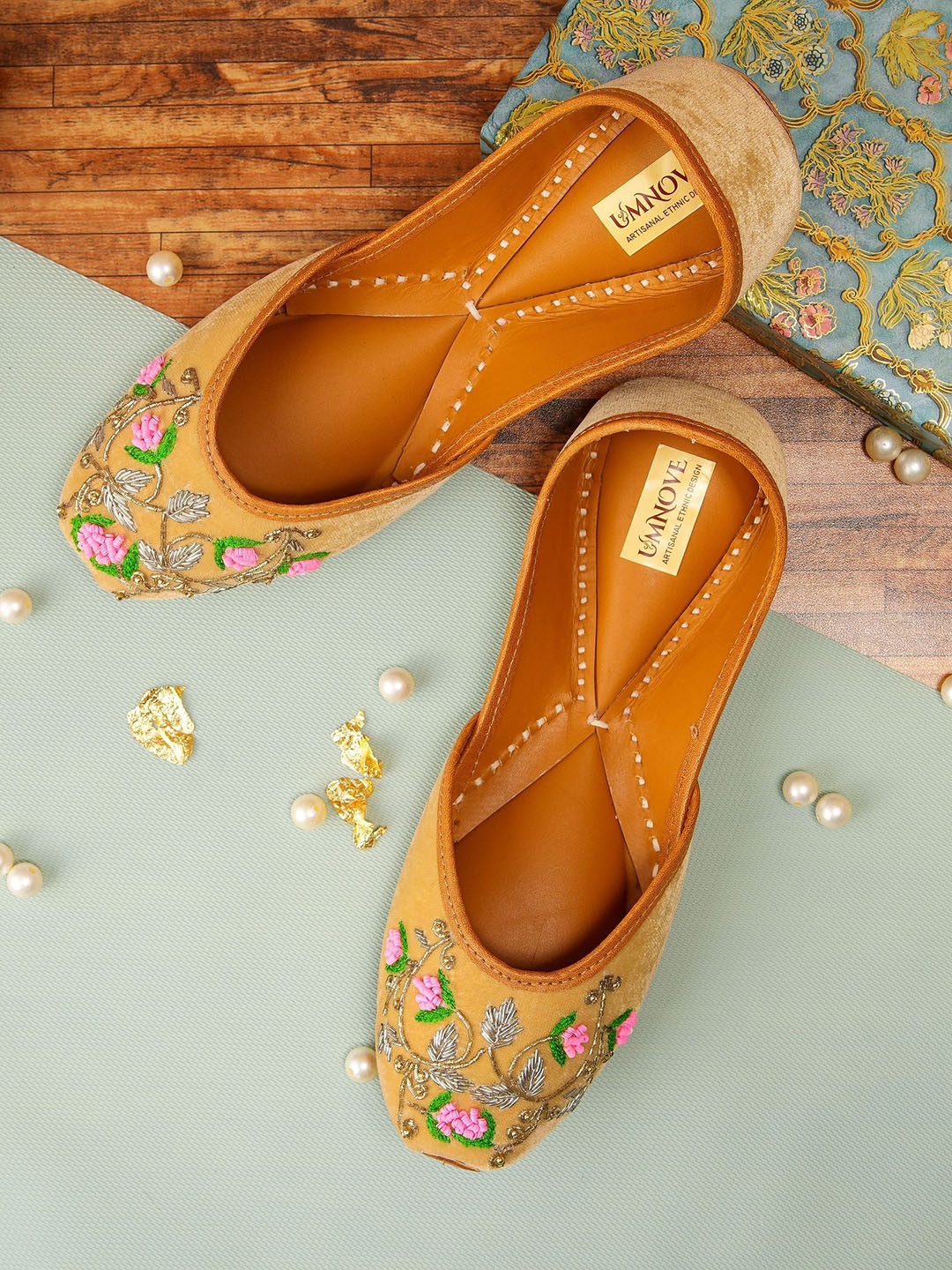 

UMNOVE Women Round Toe Embellished Mojaris, Nude