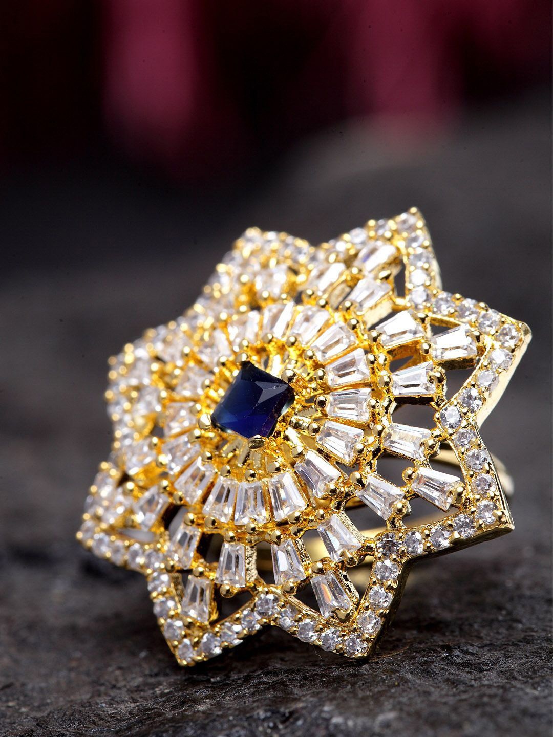 

Anouk Gold Plated American Diamond Stone Studded Star Shape Finger Ring