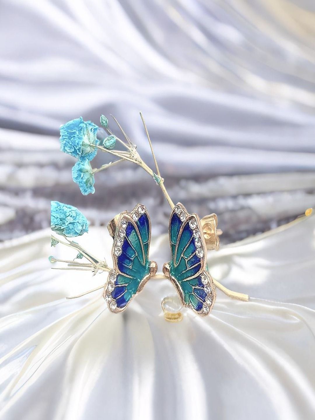 

DressBerry Blue Gold-Plated Artificial Stones Studded Contemporary Shaped Studs