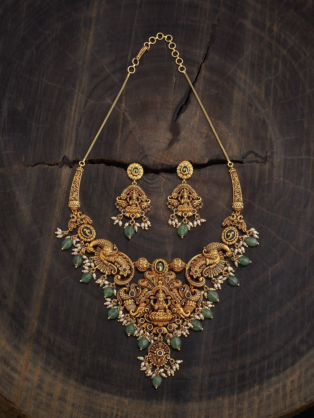 

Kushal's Fashion Jewellery Green Gold-Plated Ruby Studded Ethnic Antique Jewellery Set