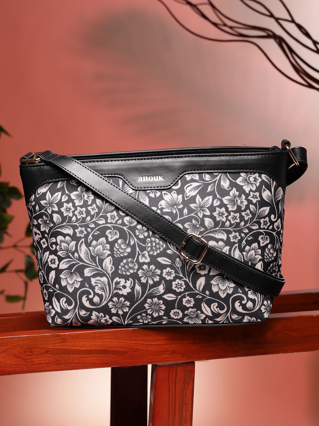 

Anouk Floral Printed PU Half Moon Sling Bag, Black