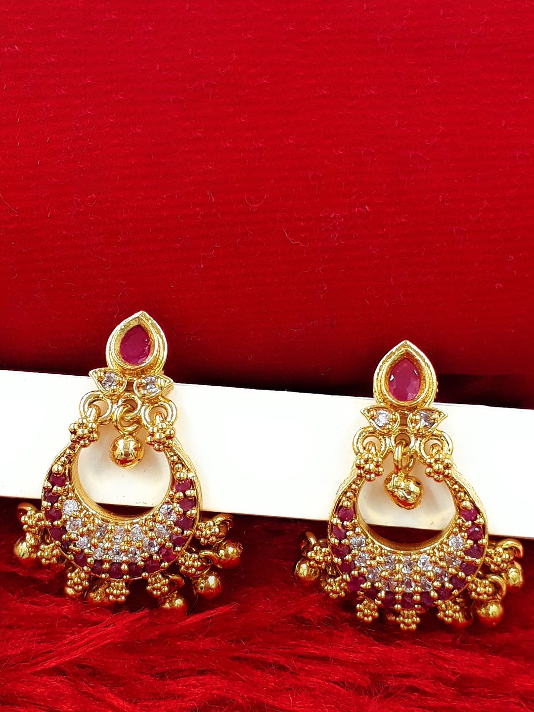

Anujeet Fashion Hub Gold-Plated American Diamond Studded Crescent Shaped Drop Earrings