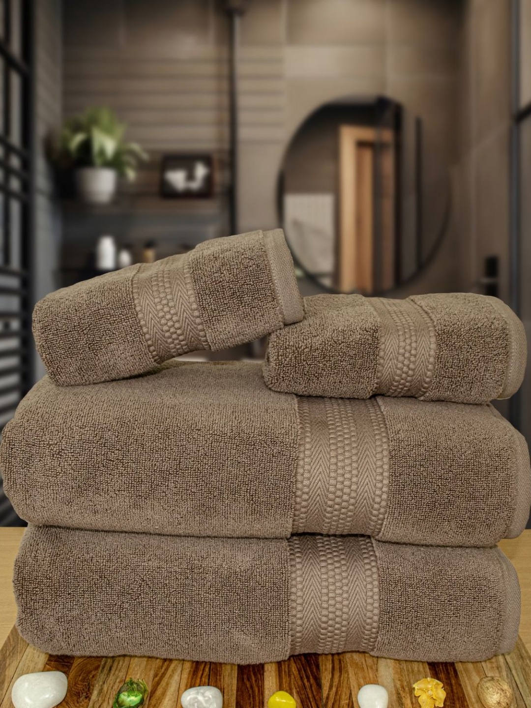 

Myntra Elegant Homes Brown 4 Pieces Self Design Pure Cotton 600 GSM Towel Set