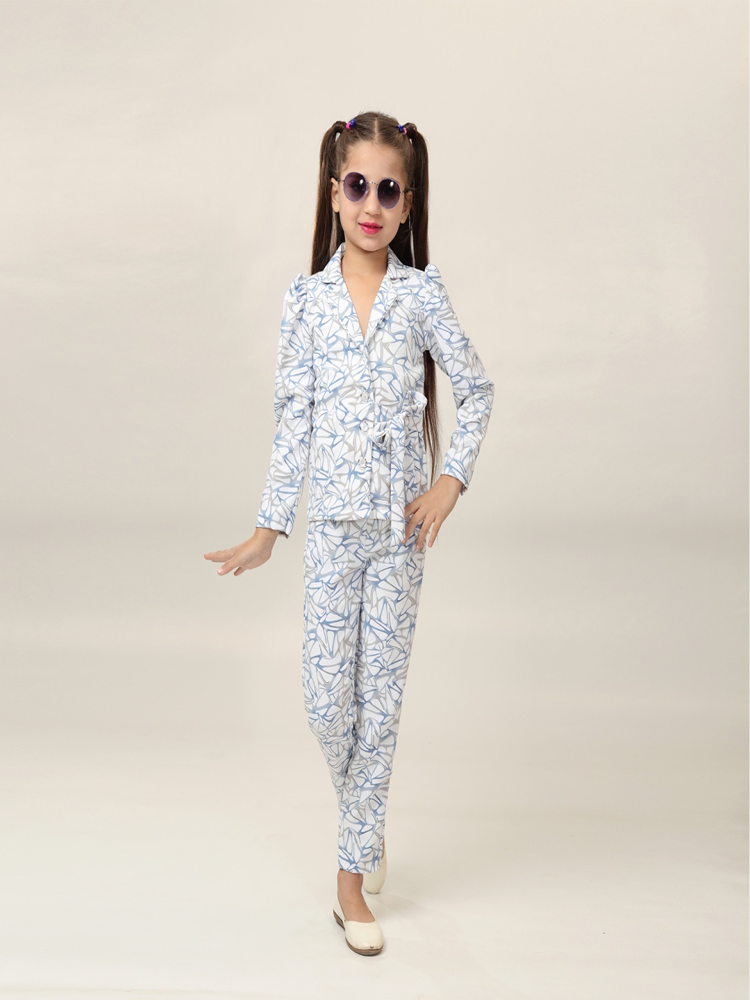 

Ishti Girls Abstract Printed Lapel Collar Top With Trousers, Blue