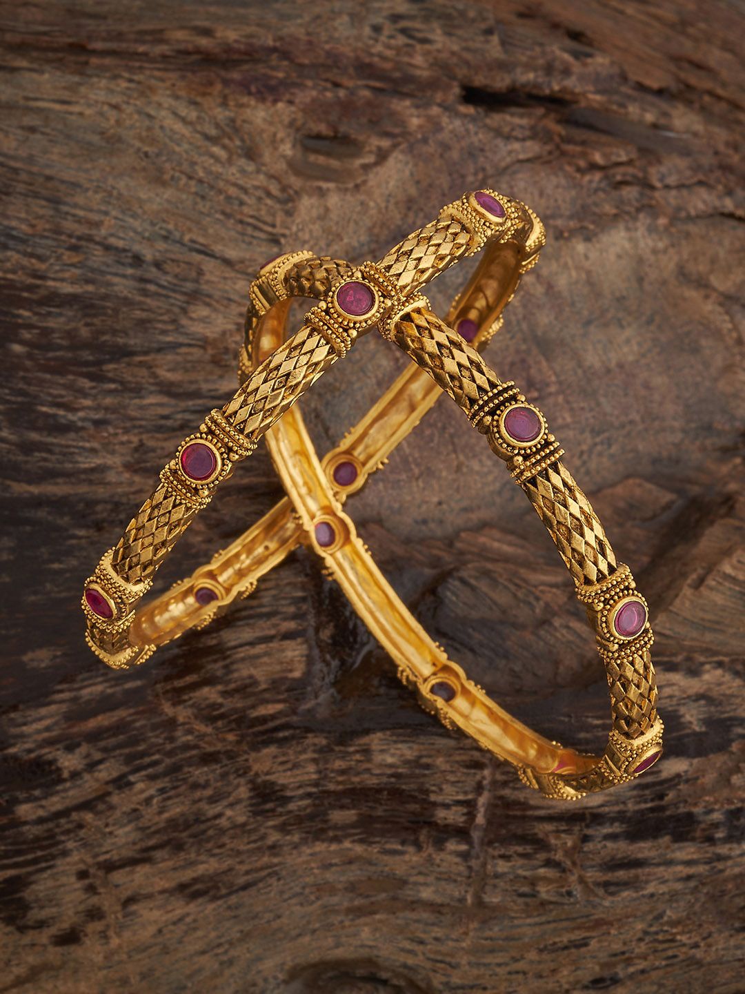 

Kushal's Fashion Jewellery Set of 2 Ruby Gold-Plated Stone Studded Ethnic Antique Bangles
