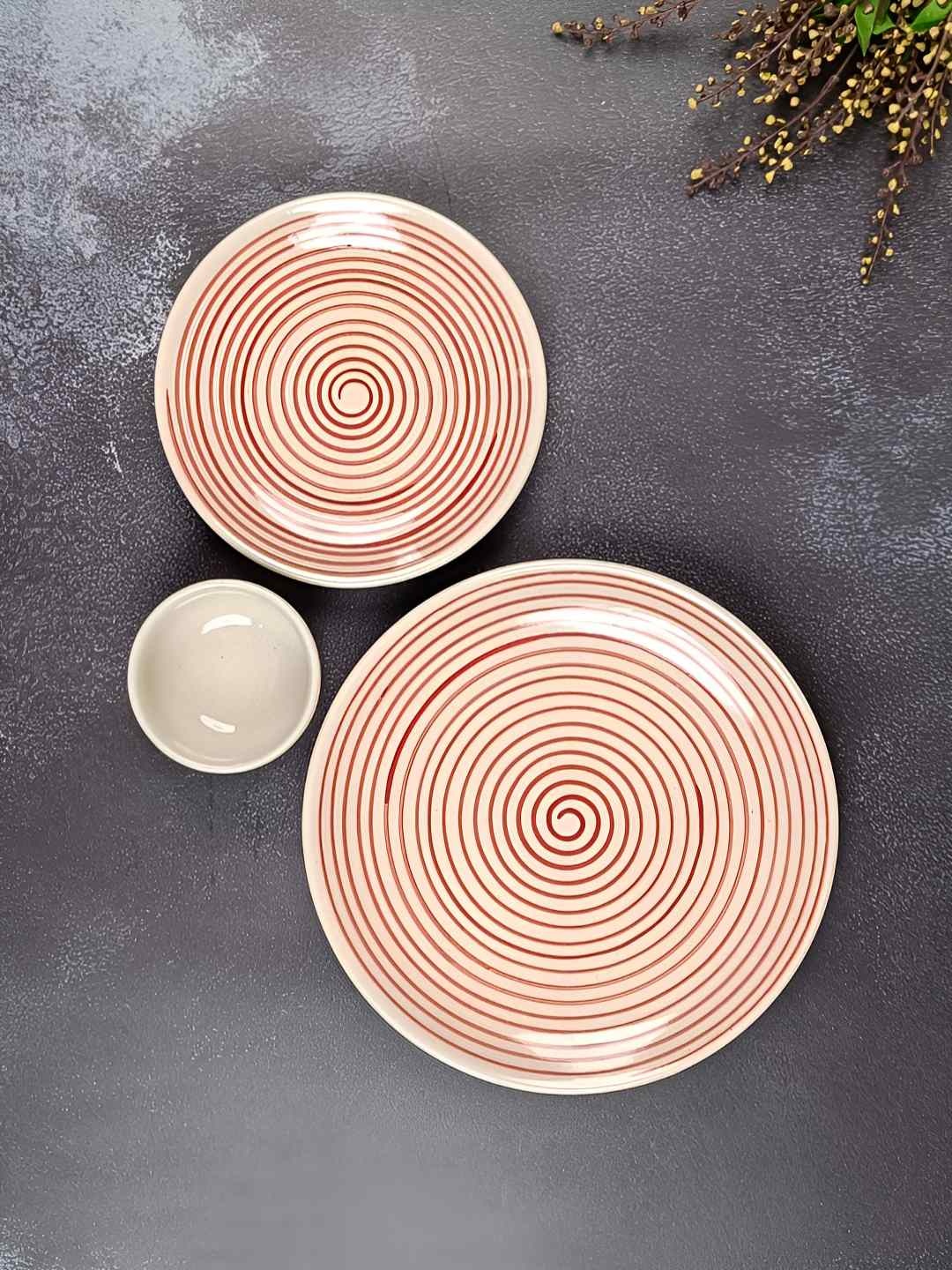 

Myntra Elegant Homes Red And Cream 3 Pieces Spiral Printed Ceramic Glossy Dinner Set