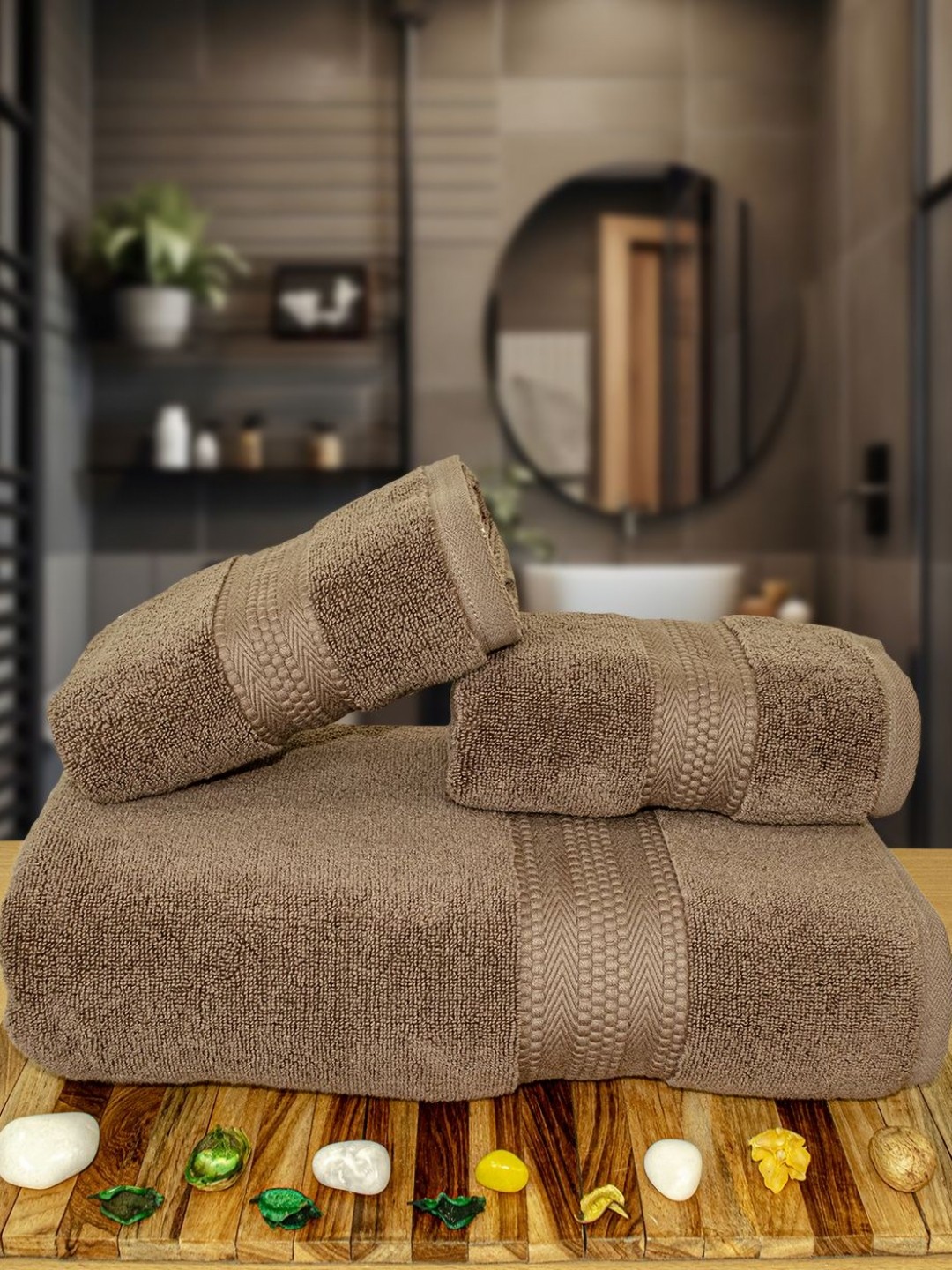 

Myntra Elegant Homes Brown 3 Pieces Self Design Pure Cotton 600 GSM Towel Set