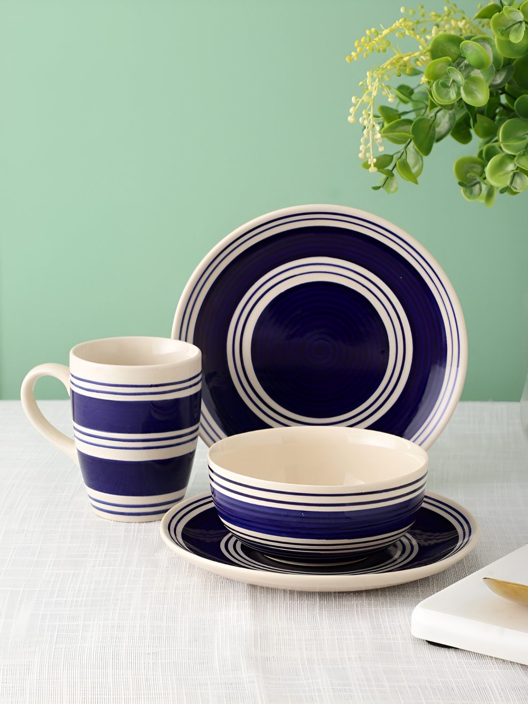 

Myntra Elegant Homes Blue 4 Pieces Printed Ceramic Dishwasher and Microwave Dinner Set
