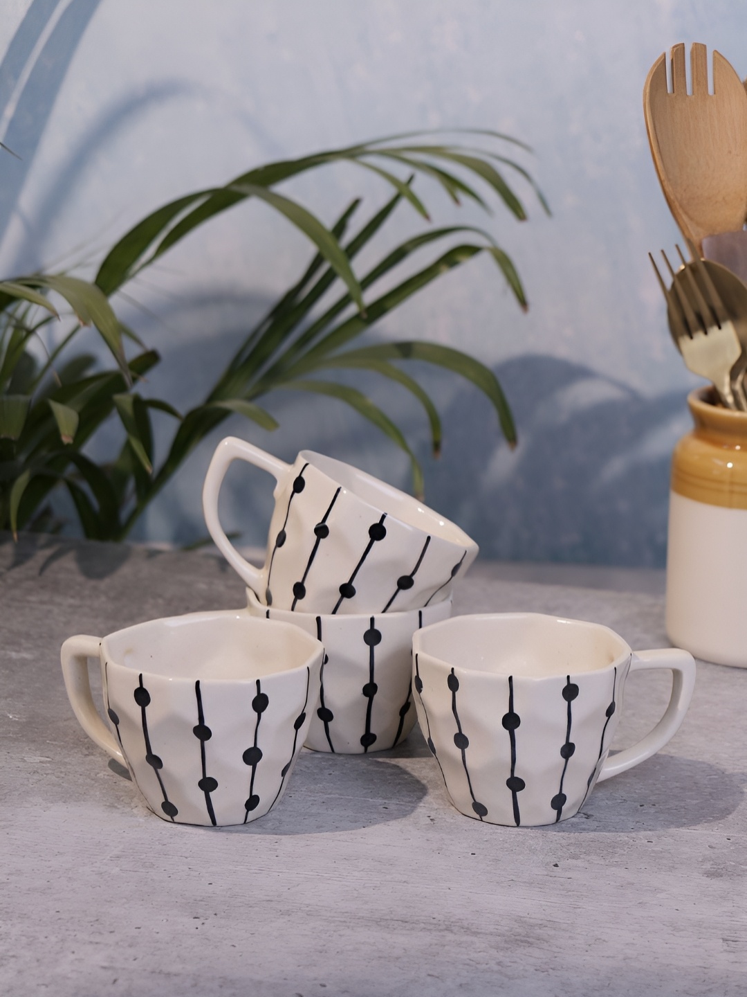 

Myntra Elegant Homes Off White 4 Pieces Striped Glossy Cups - 250 ml Each
