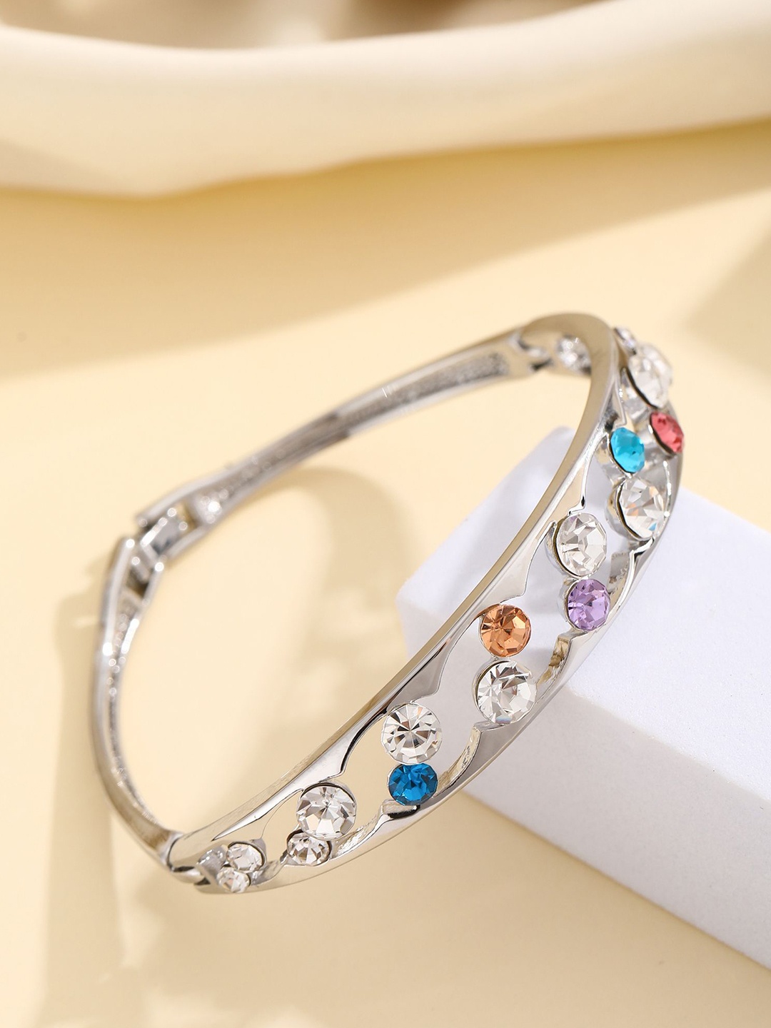 

Shining Diva Fashion Silver-Plated Artificial Stones Studded Bangle-Style Bracelet