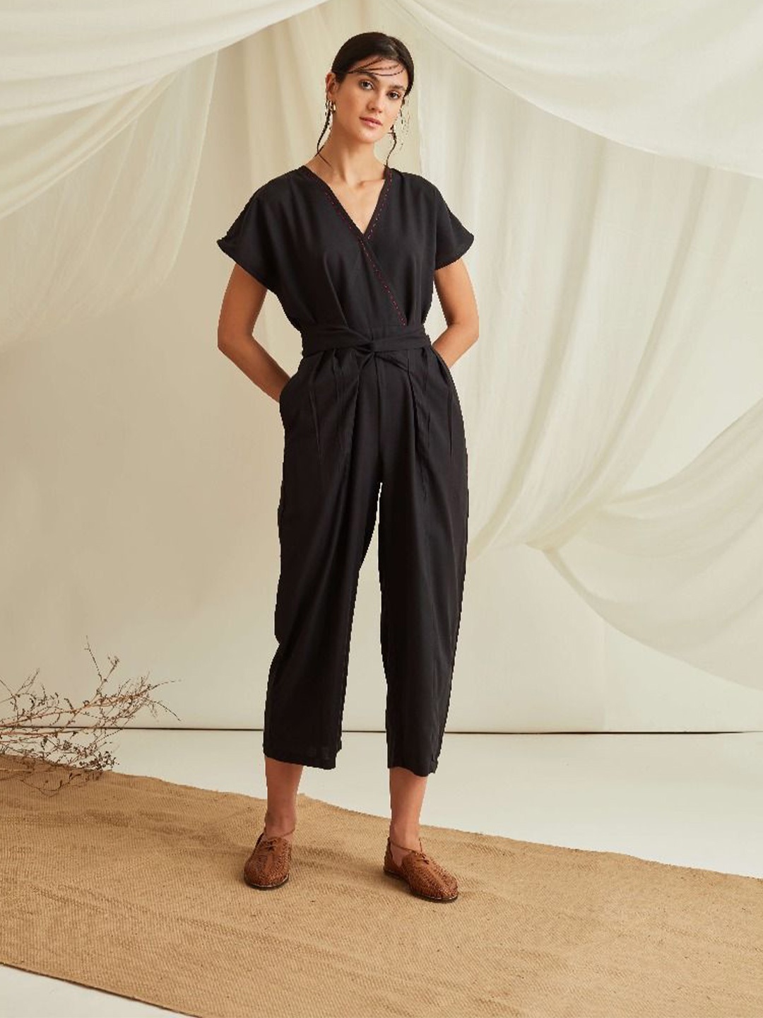 

Abhishti Women Overlapped neckline belted jumpsuit-Midnight Black