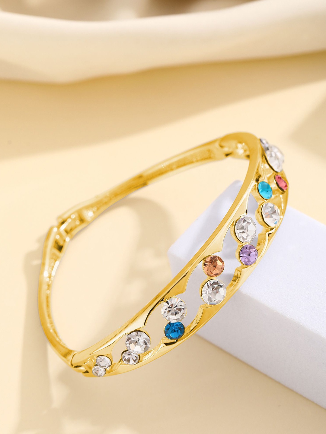 

Shining Diva Fashion Gold-Plated Artificial Stones Studded Bangle-Style Bracelet