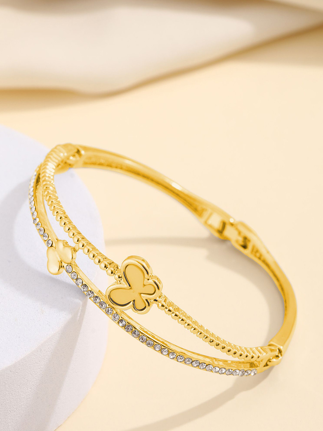 

Shining Diva Fashion Gold-Plated Crystals Studded Bangle-Style Bracelet