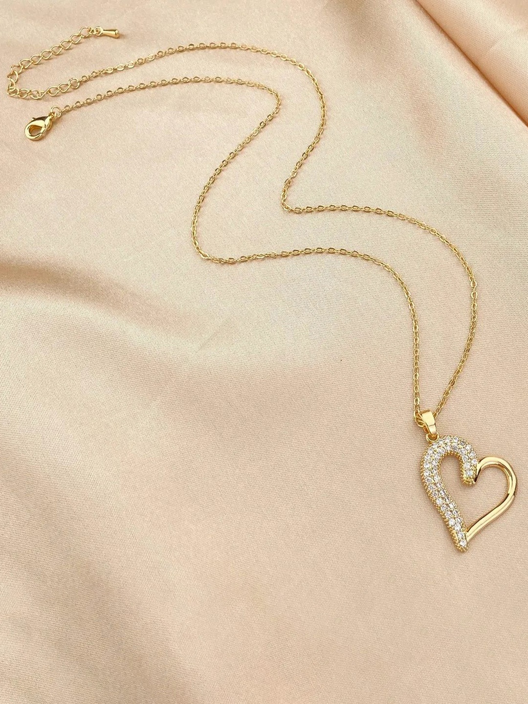 

MEENAZ Stainless Steel Gold-Plated Cubic Zirconia Studded Heart Shaped Pendant with Chain