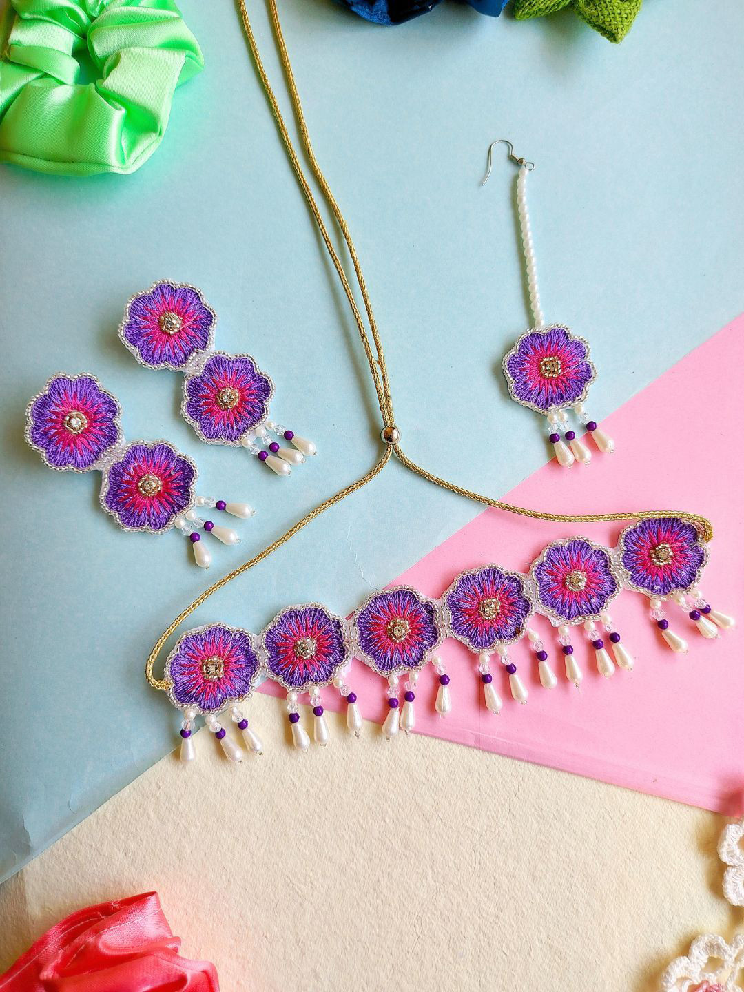 

Sangria Pink Gold-Plated Artificial Stone Studded & Beaded Floral Bridal Jewellery Set