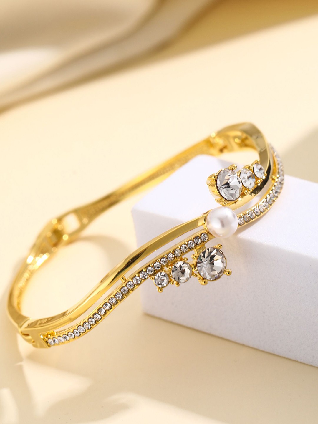 

Shining Diva Fashion Gold-Plated Crystals Studded Bangle-Style Bracelet
