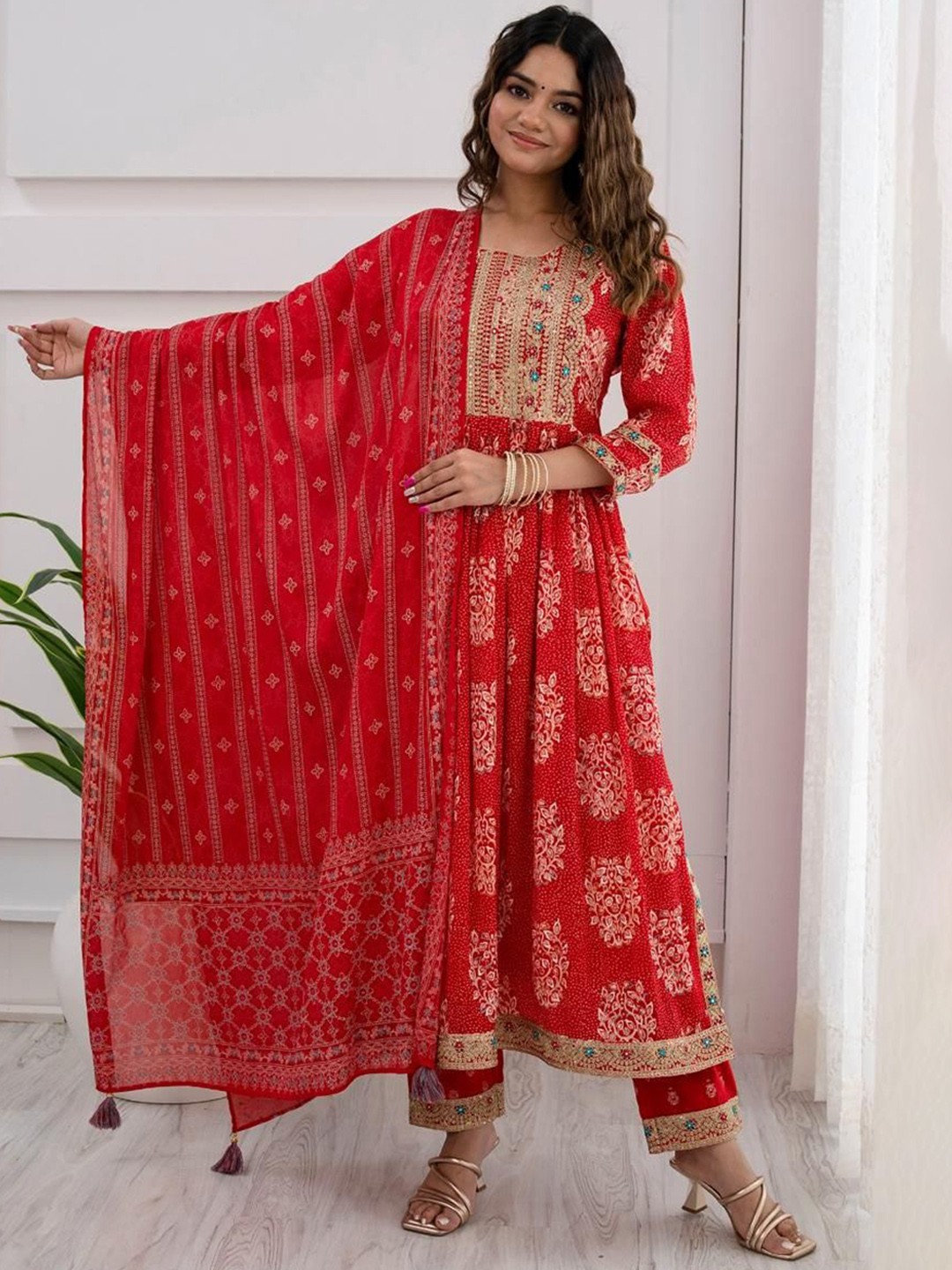 

Gauric creation Floral Embroidered A-Line Kurta With Trousers And Dupatta, Red