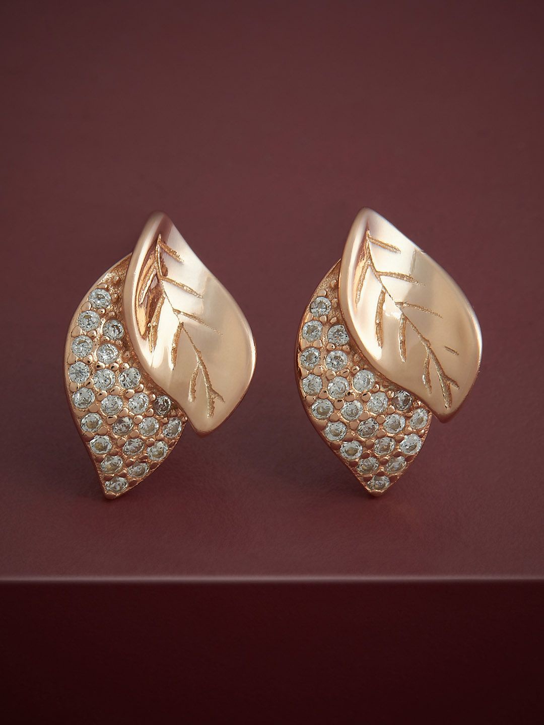 

Kushal's Fashion Jewellery 92.5 Silver Rose Gold Toned Leaf Studs Earrings