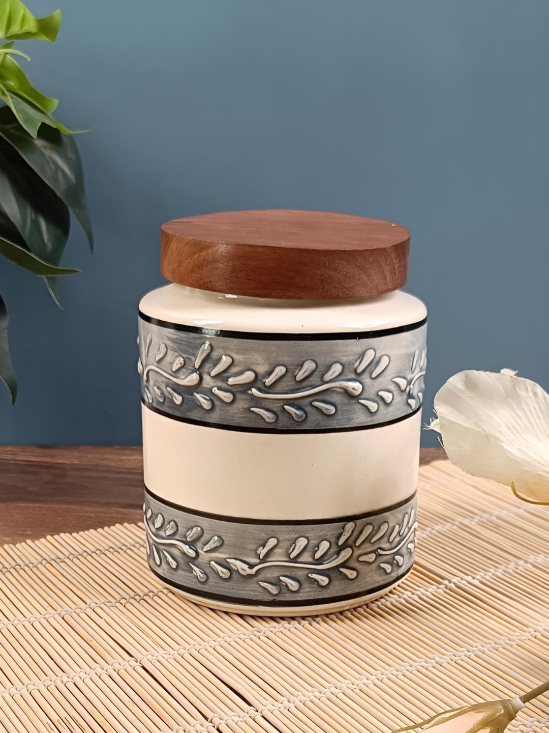 

Myntra Elegant Homes Grey & Cream Colored Printed Ceramic Container 700ml With Wooden Lid