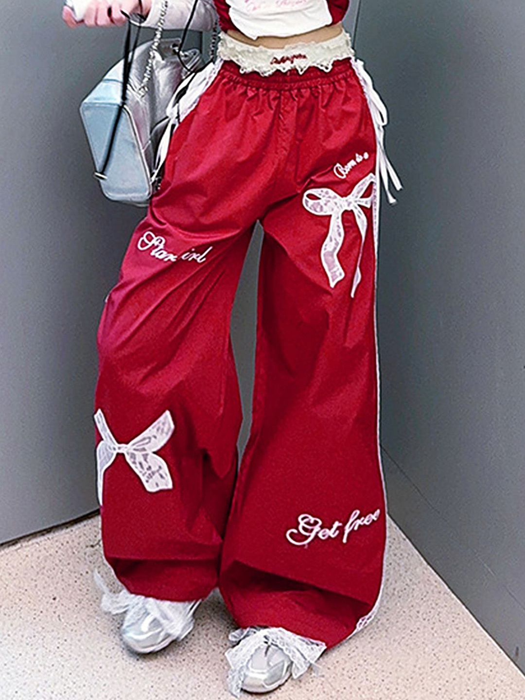 

LULU & SKY Girls Loose Fit Bow Printed Parachute Trousers, Red