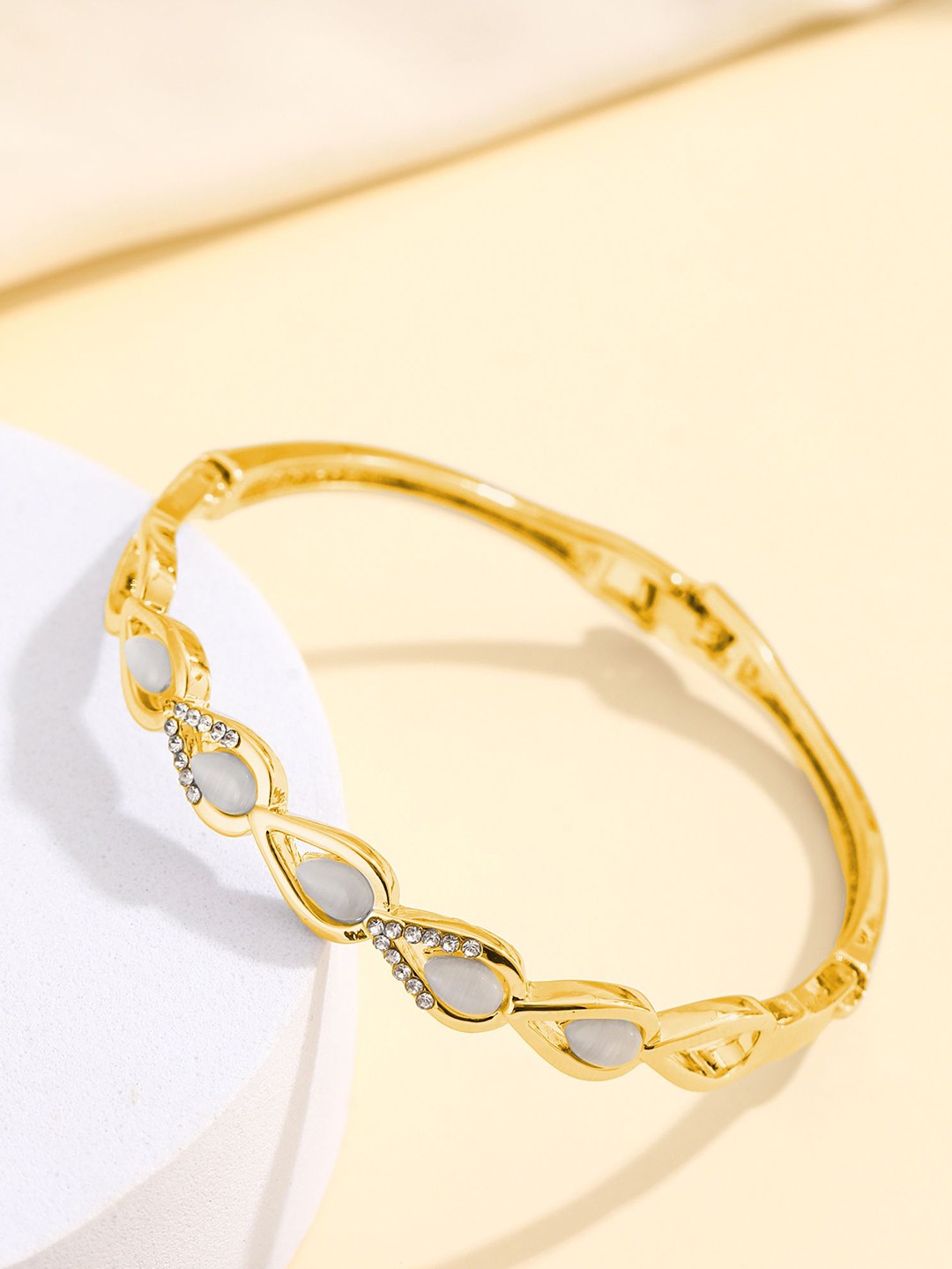 

Shining Diva Fashion Gold-Plated Crystals And Stones Studded Bangle-Style Bracelet