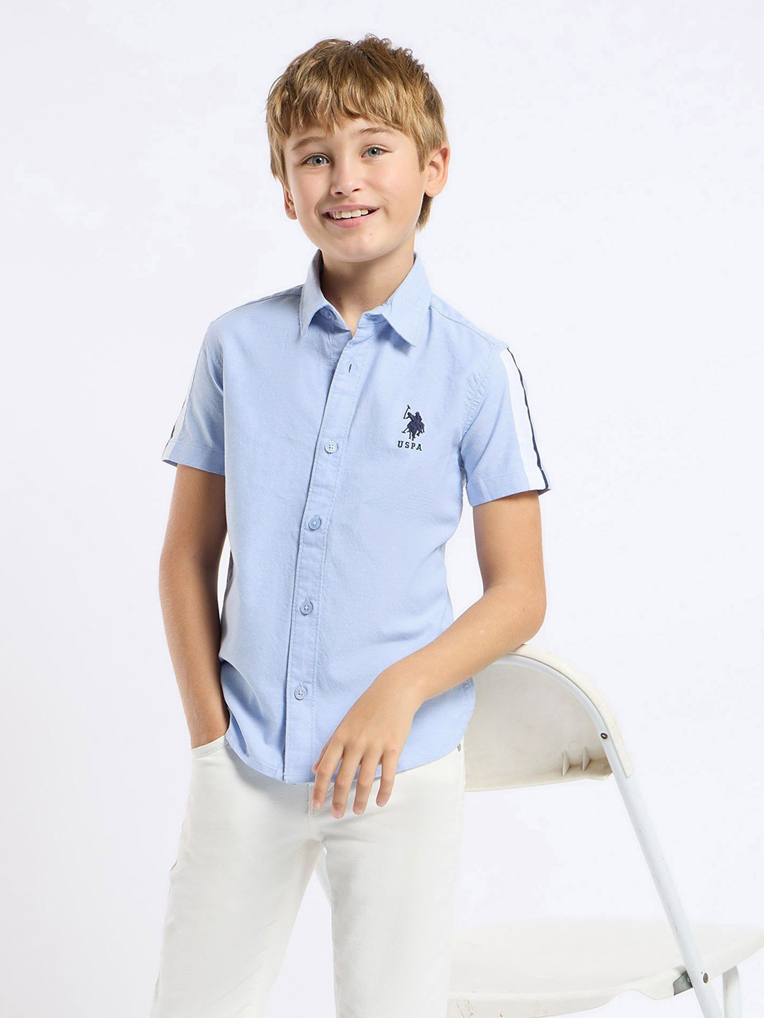 

U.S. Polo Assn. Kids Boys Classic Fit Spread Collar Solid Cotton Casual Shirt, Blue