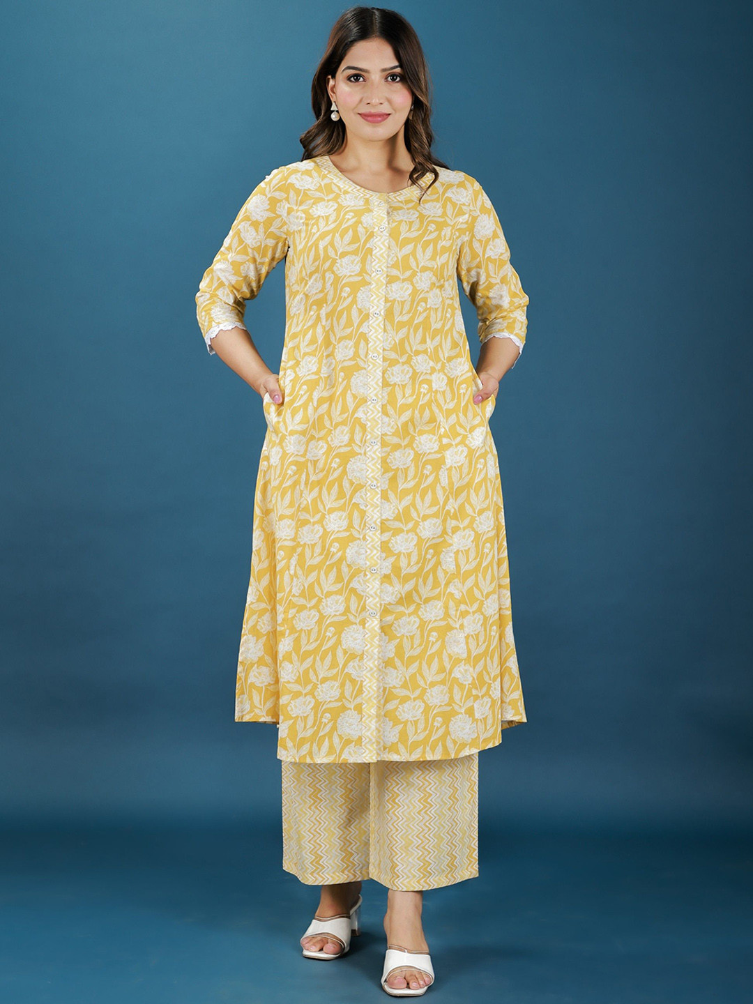 

Aramya Floral Printed Round Neck A-Line Pure Cotton Kurta With Palazzos, Yellow