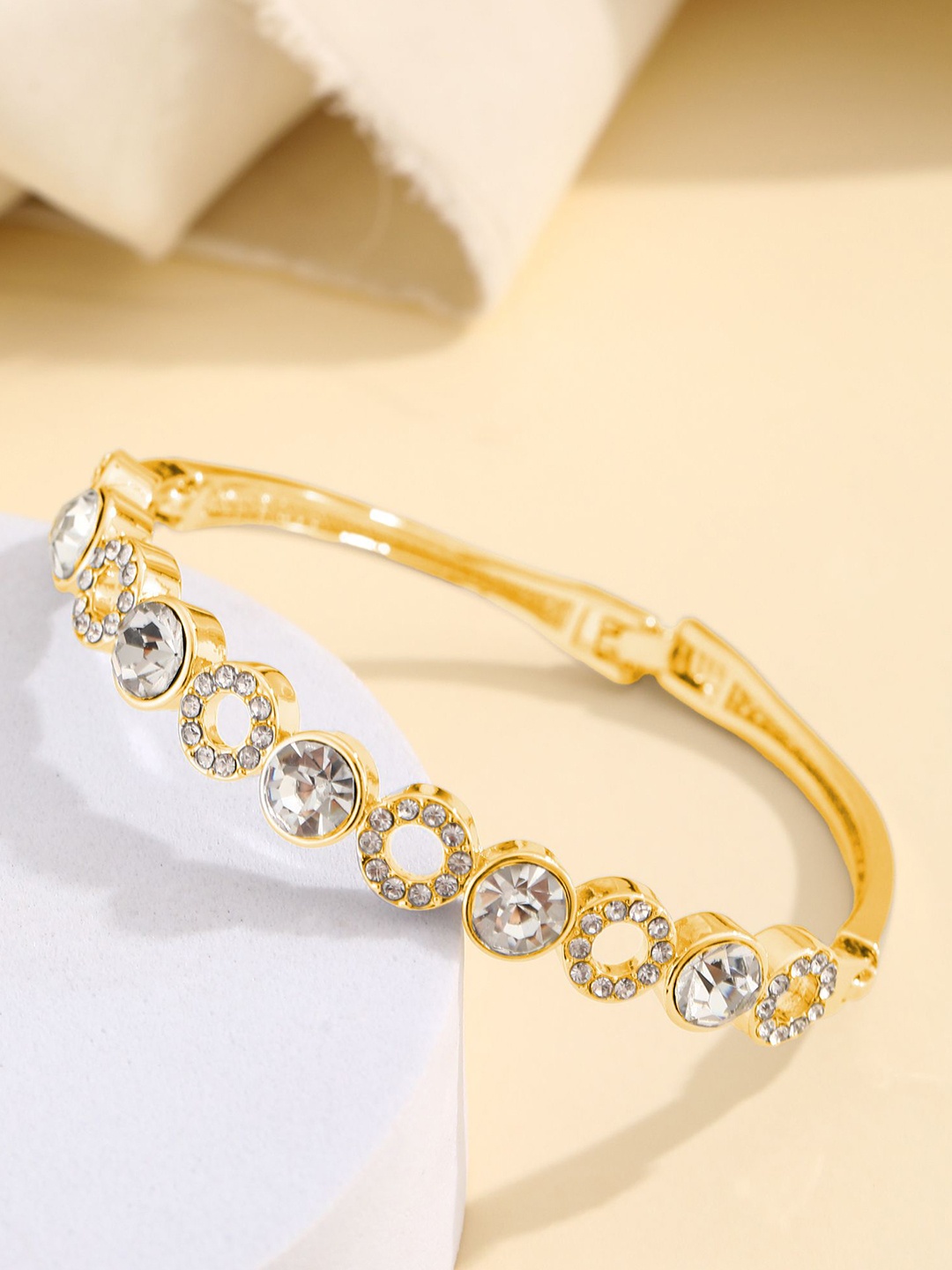 

Shining Diva Fashion Gold-Plated Crystals And Stones Studded Bangle-Style Bracelet