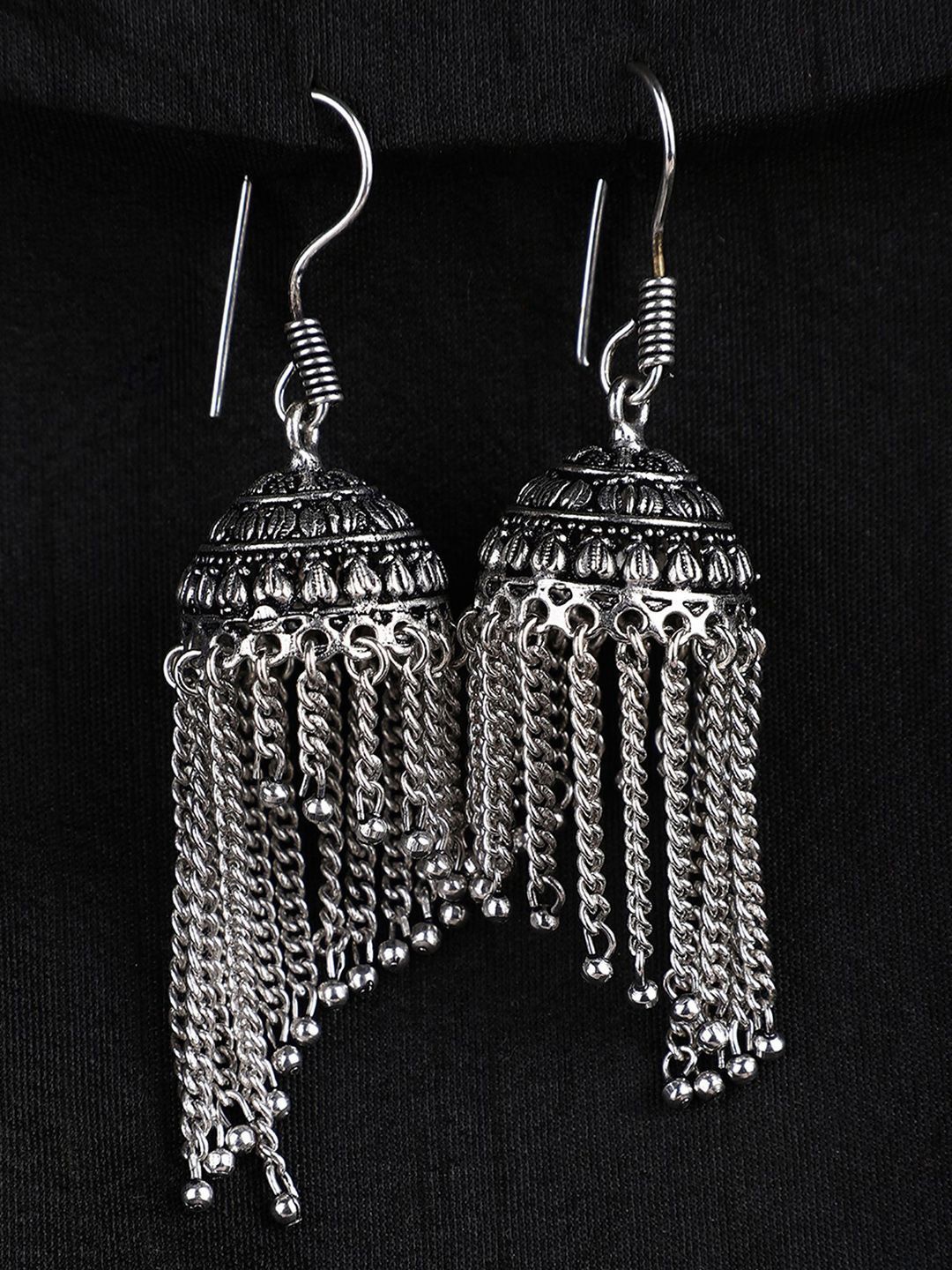 

Sangria Silver-Toned Asymmetric Dome Shaped Oxidised Tasseled Jhumka