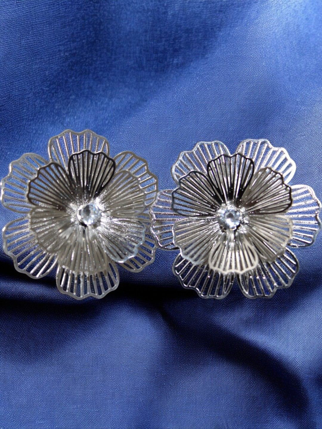 

Jolly Faces Artificial Stones Studded Floral Studs, Silver