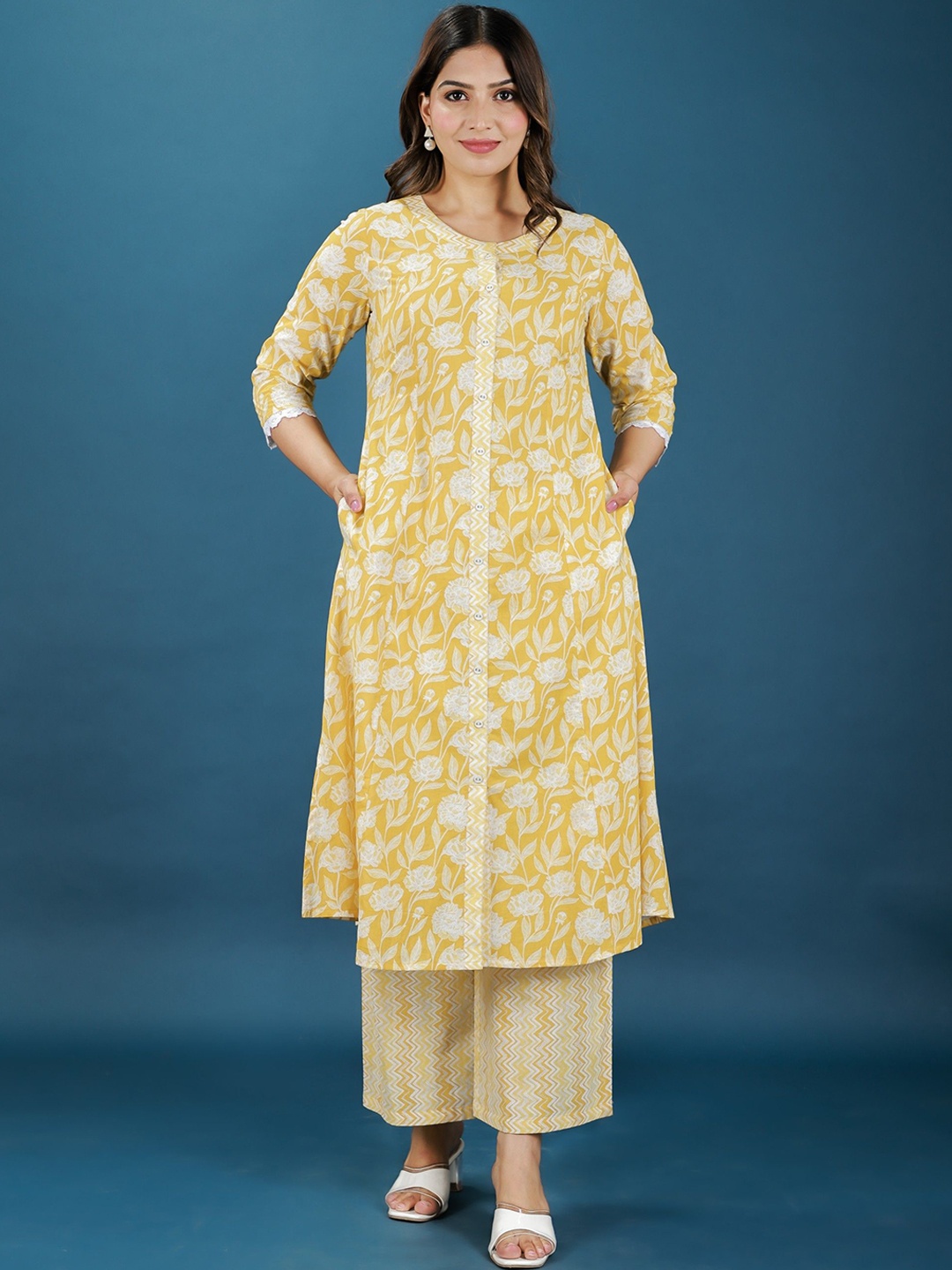 

Aramya Floral Printed Round Neck A-Line Pure Cotton Kurta With Palazzos, Yellow