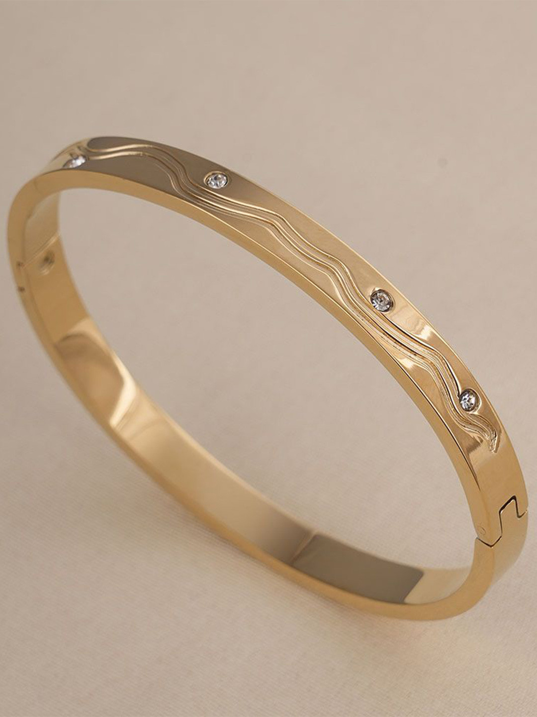 

PALMONAS Women Gold-Plated Anti-Tarnish Cubic Zirconia Studded Bangle-Style Bracelet