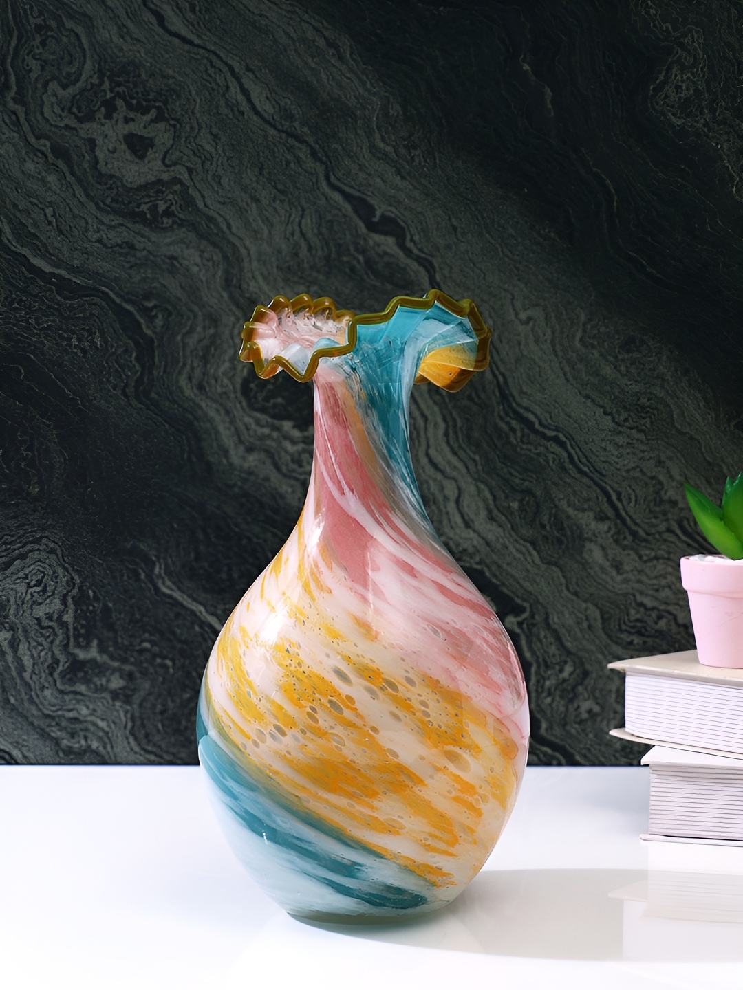 

Myntra Elegant Homes Ruffled Yellow & Blue Printed Glass Flower Vase