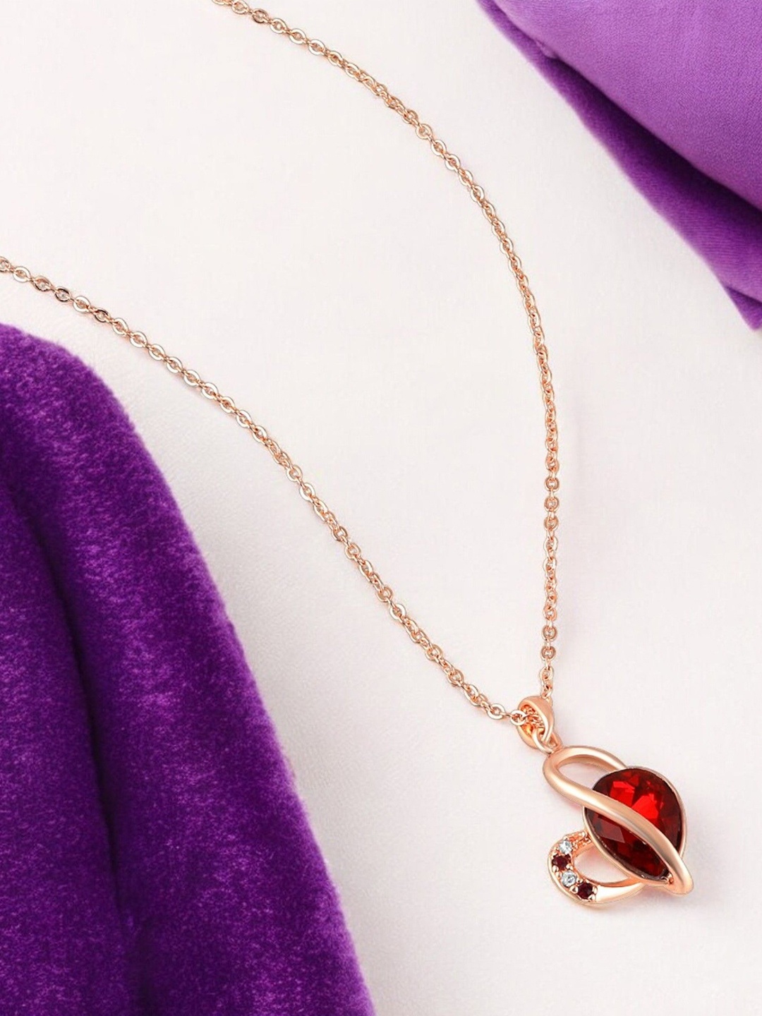 

Mahi Rose Gold-Plated Artificial Stones-Studded Heart Shaped Pendants with Chains