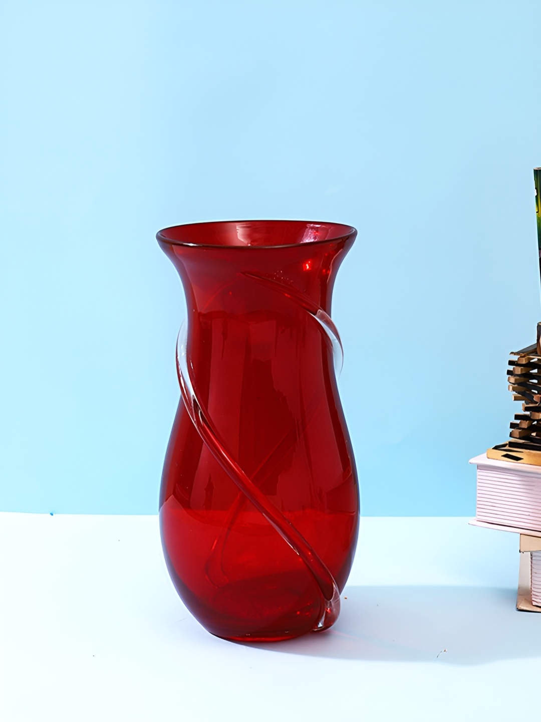 

Myntra Elegant Homes Red Textured Glass Flower Vase
