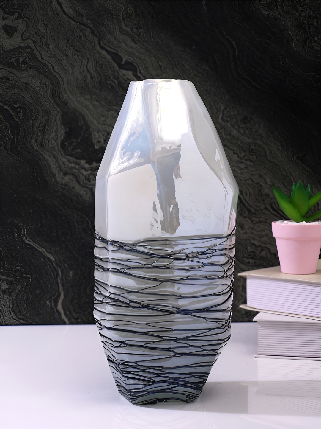 

Myntra Elegant Homes Ocean Black & White Textured Glass Flower Vase