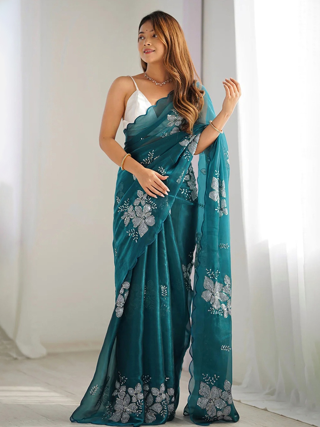 

Divyadham Textiles Floral Sequinned Satin Bomkai silk Saree, Turquoise blue