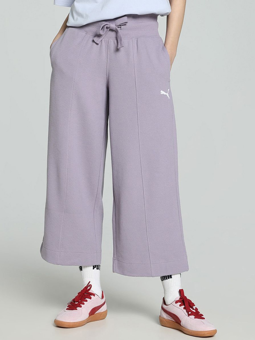 

Puma Her Women Brand Name Printed Pure Cotton Mid Rise Straight Pants, Purple