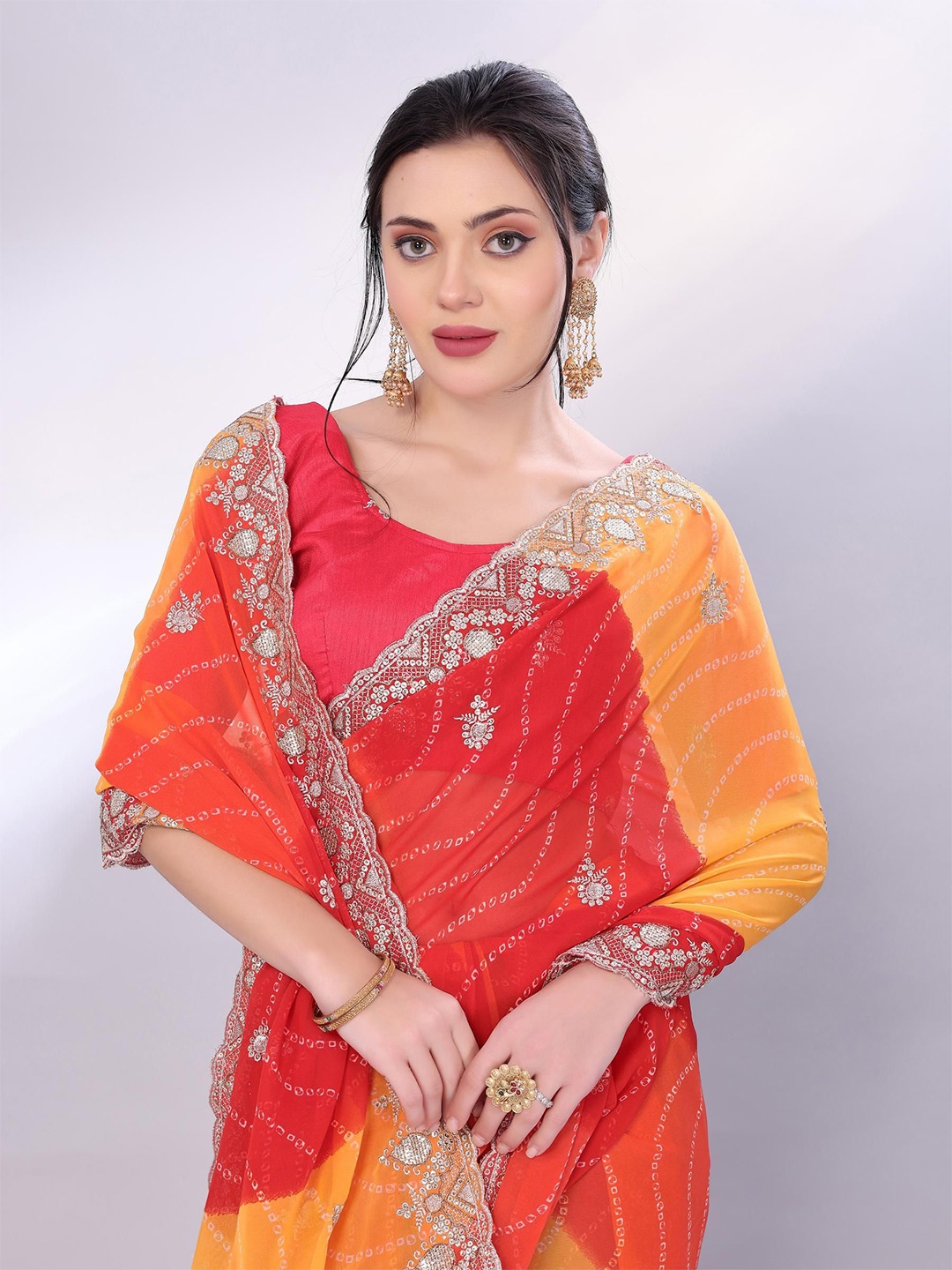 

HERE&NOW Bandhani Embroidered Poly Georgette Designer Bandhani Saree, Orange