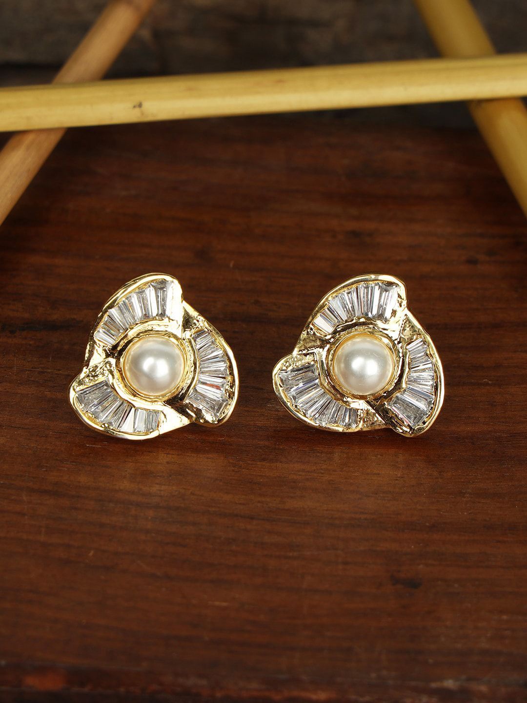 

Anouk Gold Plated Floral American Diamond Stone Studded Studs Earrings