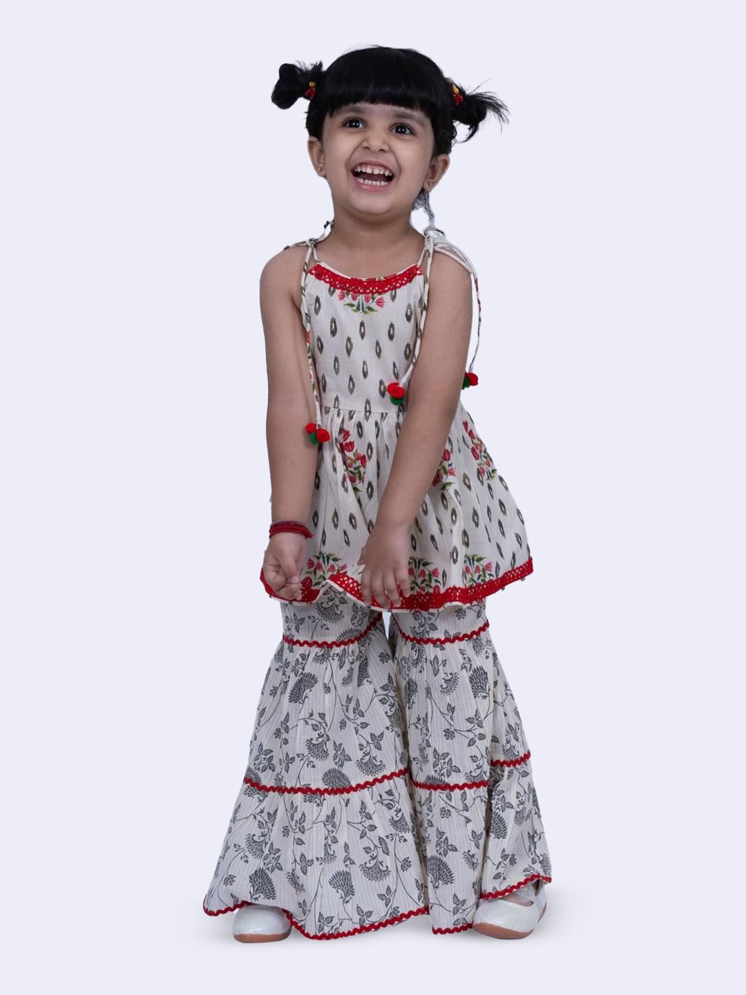 

Twisha Girls Floral Printed Shoulder Straps Pure Cotton A-Line Kurta With Sharara, Off white